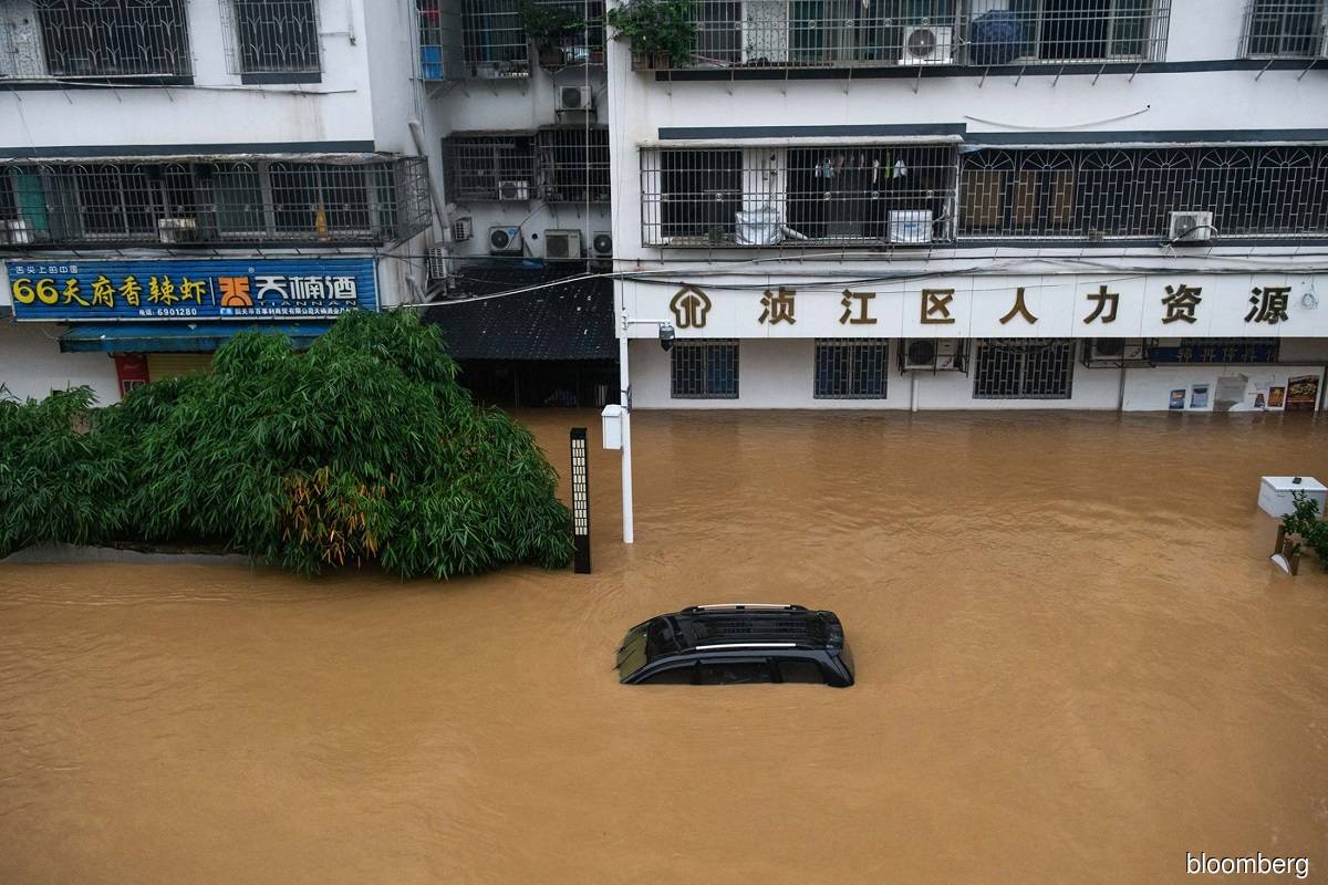 China’s manufacturing hub raises flood alert to highest level